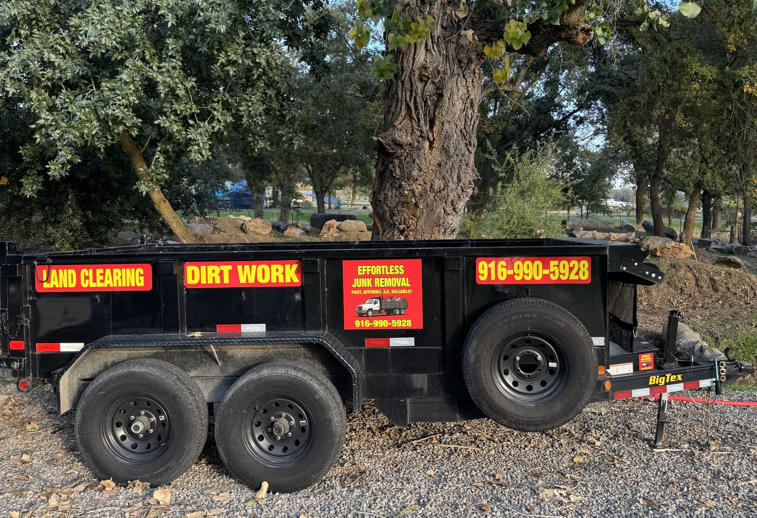 Effortless Junk Removal trailer — side view on location
